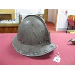 A Coned Marion Pikemans Helmet, no lining, domed rivets, peaked rim, rust holes to front and back,