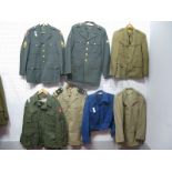 Seven Assorted Post War United States of America Army Tunics and Blouses.