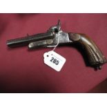 A XIX Century Percussion Double Barrel Pistol, pin fire, slide safety to top of barrels, folding