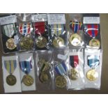 Twelve American Military Medals, including, U.S.A Navy Reserve Medal, U.S Army Commanders Award