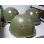 Three Post War European Military Helmets.