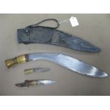 A XIX Century Nepalese Kukri with Horn Handle, with original sheath decorated with white metal