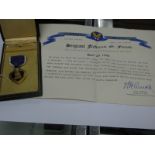 A WWII American Casualty Purple Heart, in original case with Citation of Honor, to Sergeant