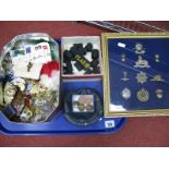 A Quantity of British Military Cap Badges, some framed, Royal Navy Hat Tallys, Russian badges amoung