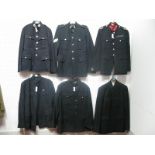 Six Post War British Military Dress Blues, Officers and Band badges noted.