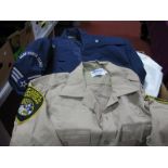 A Quantity of Modern Predominately Civil North American Clothing Items, including jackets, shirts,