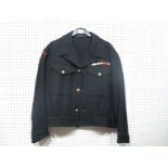 A Special Boat Service Commando Tunic, with WWII medal ribbons undated.