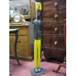 A Large Carved Hardwood Slender Figure of an Indian Soldier, on rectangular base, 107cm high