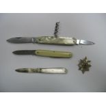 A Hallmarked Silver and Mother of Pearl Single Blade Folding Fruit Knife, two folding penknives