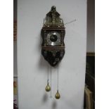 A Dutch Wall Clock, with German movement and brass pear drop weights.