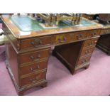 Bowling's Reproduction Mahogany Pedestal Desk, with a crossbanded top green leather scriver, three