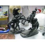 A Pair of Black Painted Spelter Marley Horses, each with male tetherer, on naturalistic base, 29ch