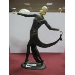 After Lorenzl, A Reproduction Bronze Effect Art Deco Figure of a Lady, with outreached arms, resin