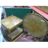 A Walnut Pedestal Table, with a pie crust top, together with a yew wood two tier lamp table, and a