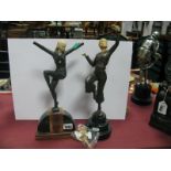 Two Reproduction Art Deco Style Bronze Effect Figures, each in stylized dancing poses, resin