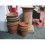 Eight Terracotta Planters, to include Sankey, a similar cylindrical pedestal on square base, 55cm
