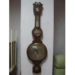 A XIX Century Rosewood Banjo Barometer by Beha of Nottingham, having dry/damp gauge, thermometer,