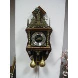 A Dutch Wall Clock, with German movement and brass pear drop weights.