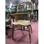 A XIX Century Style Ash-Elm Windsor Chair, with a hooped back rail supports, on turned legs, with