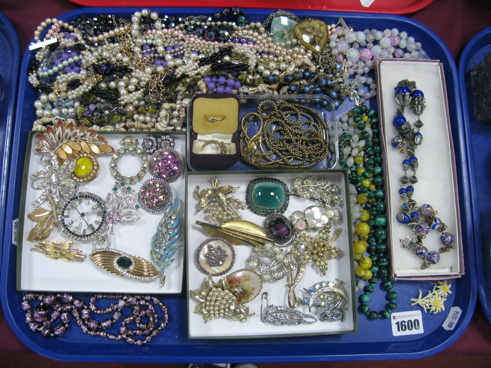 A Selection of Vintage and Later Costume bead Necklaces, including foil, ornate brooches and dress