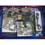 A Selection of Vintage and Later Costume bead Necklaces, including foil, ornate brooches and dress