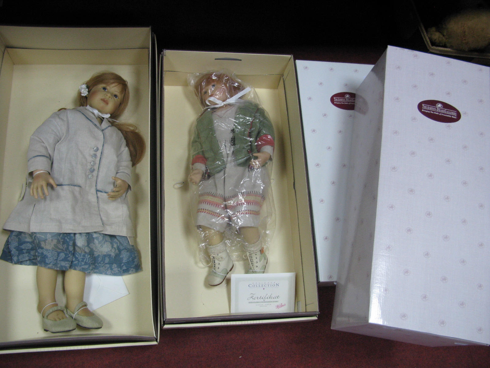 Two Zapf Creation Dolls, 'Victoria' & 'Henriette' and two Ashton-Drake porcelain dolls 'Honey' and