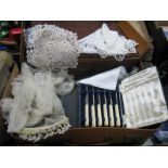 A Bridal Coronet and Veil, doilies, fish knives and fork, (cased), fruit knives, (cased) in a