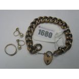 A Vintage Curb Link Bracelet, of semi textured design, to heart shape fastener, stamped "9ct", a