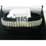 A Modern 9ct Gold Diamond Set Bracelet, of three row design, illusion set throughout with