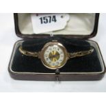 A Vintage 9ct Gold Cased Ladies Wristwatch, the unsigned dial with black Arabic numerals, the