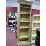 A Slender Pine Bookcase, with stepped pediment and adjustable shelves, 66cm wide.