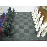 A Resin Chess Set, in black and white.