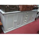 Nuovofiore Italian Blue Limed Effect Sideboard, having shell handles to four cupboard doors,