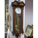 A XIX Century Walnut Cased Viennese Wall Clock, with enamelled dial, subsidiary dial, eight day