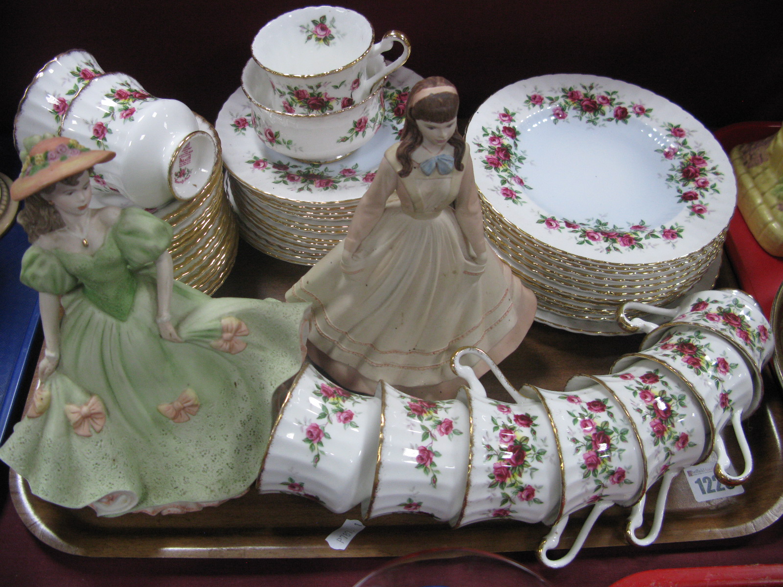 Paragon 'County Fair' Tea Ware, of forty eight pieces, Coalport matt figurines 'Jo' and 'Midsummer