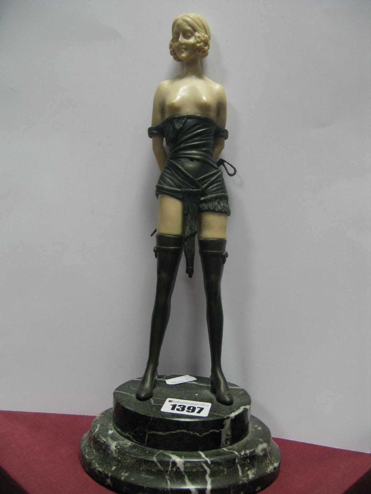 A Reproduction Art Deco Style Bronze Effect and Resin Model of a Female with Whip, on stepped oval