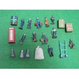 A Quantity of Both Pre and Post War Hornby Station Accessories, including figures and luggage.