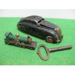 A Mid XX Century Schuco Kommando Anno 2000 Clockwork Car and a Matchbox Yesteryear 'Sante Fe',