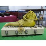 An Original Star Wars Trilogy Jabba The Hutt Action Playset, comprising of Jabba, two bowl halves,