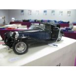 A Franklin Mint 1:24th Scale Diecast Model 1930 Bugatti Royale Coupe Napoleon, accompanied by