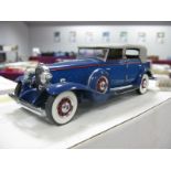A Franklin Mint 1:24th Scale Diecast Model 1932 Cadillac V-16, accompanied by literature, damage