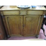 William IV Rosewood Cabinet, with twin panelled doors, reeded pillars, on reeded feet.