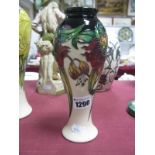 A Moorcorft Pottery Vase, painted in the 'Anna Lily' design by Nicola Slaney, shape 122/8, impressed