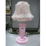 A Circa 1930's Art Deco Bedroom Lamp, featuring a pink bakelite base and pink mottled shade (