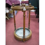 Early XX Century Oak Stick Stand of Circular Form, with three dividers, turned supports and