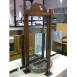 An Early XX Century Mahogany Demi Lune Stick Stand, complete with galvanised drip tray.
