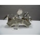 A Highly Decorative German Bottle Stopper Stand, stamped crescent and crown and "800", of arch