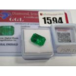 An Emerald Cut Emerald, unmounted; together with a Global Gems Lab Certificate card stating carat