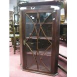 Early XIX Century Mahogany Corner Cupboard, with a glazed astragal door, three internal shelves. (