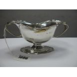 A Decorative Hallmarked Silver Twin handled Footed Dish, Jackson & Fullerton, London 1905, of